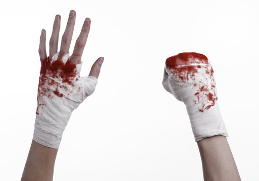 bloody hand in a bandage, bloody bandage, white background