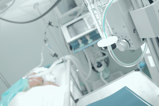 Patient Receiving Mechanical Ventilation In A Hospital Ward