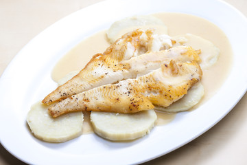 fried halibut with sweet potatoes and lemon sauce