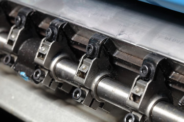 Close-up of shaft offset heavy machine