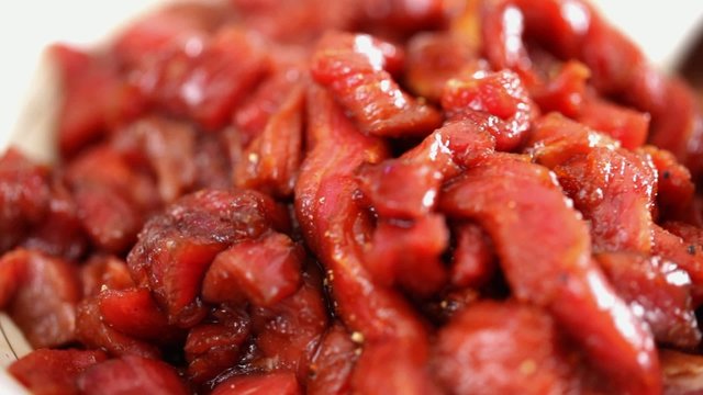 Asian cuisine - beef chunks in dark soy sauce marinade