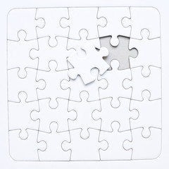 Fototapeta premium White jigsaw puzzle