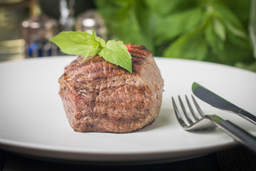 dinner plate with beef steak
