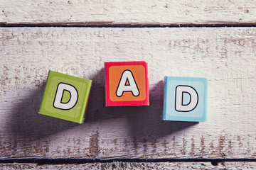 Fathers day composition. Studio shot on wooden background. - Powered by Adobe