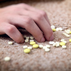 Hand near the Pills