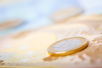 Closeup of euro banknotes and coins