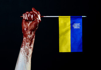 Bloody hands, the flag of Ukraine in the blood, revolution