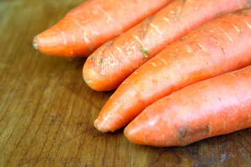 Carrots  on wooden distressed background