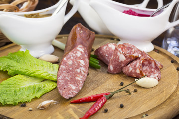 sausage on a wooden plate in a restaurant
