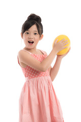 Little asian girl holding melon