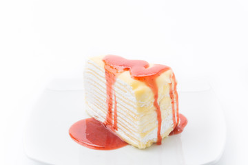 vanilla crape cake with strawberry jam