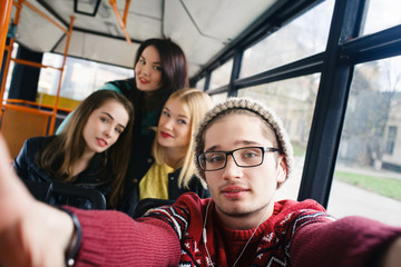 smiling  people with smartphone traveling bus , making selfie