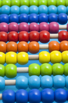 Full frame close-up of an abacus with multi coloured beads
