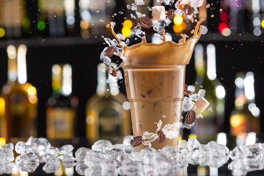 Cold Coffee Drink With Ice, Beans And Splash