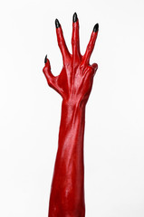 Red Devil's hands, red hands of Satan, white background isolated