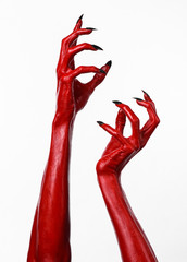 Red Devil's hands, red hands of Satan, white background isolated - 83524581