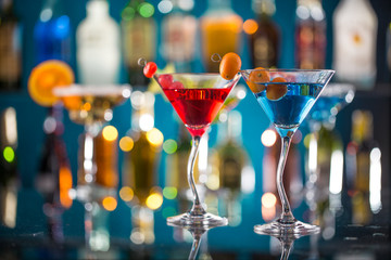 Cocktail with ice vapor on bar desk