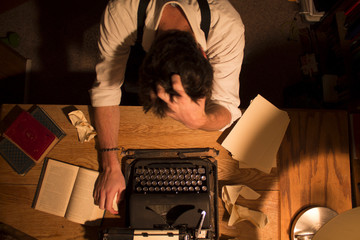 USA, Idaho, Bannock County, Pocatello, Writer sitting at desk unable to write