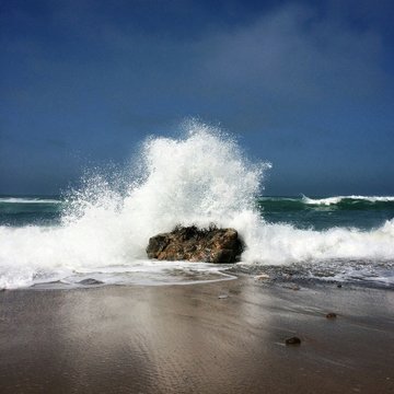 Portugal, Wave crashing against rock