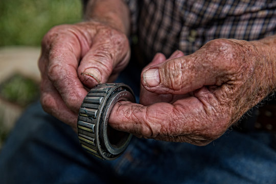 Close up of senior man holding bearing 