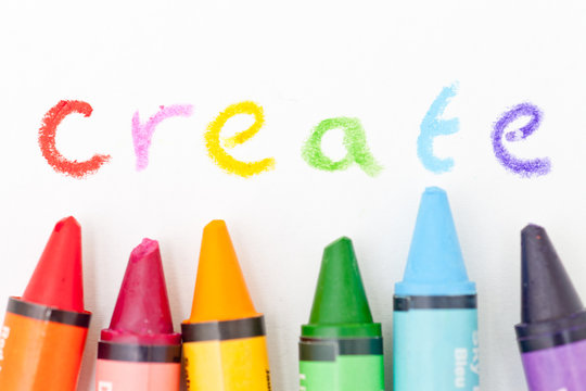 The word Create Written In different coloured Crayons