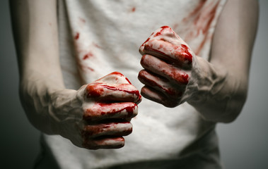 murderer shows bloody hands and experiencing depression and pain © Alex