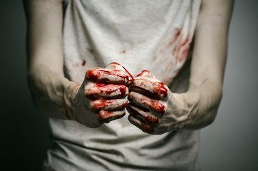 murderer shows bloody hands and experiencing depression and pain © Alex