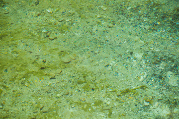 bottom surface of a silicon source under water