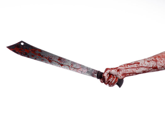 Hand Holding A Bloody Machete On A White Background