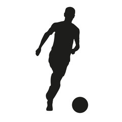 Fototapeta na wymiar Silhouette of a soccer player