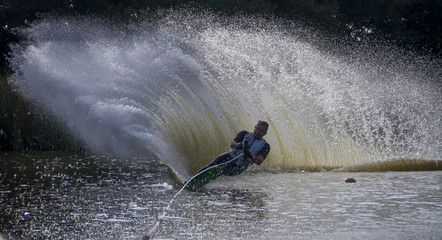 Water-skier skiing slalom course