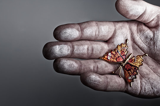 USA, Idaho, Ada County, Boise, Man holding hand made butterfly gift in hand
