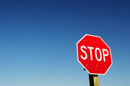 Stop sign against clear sky