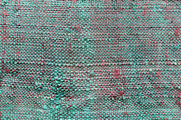 Pattern of green woven fabric colorful.