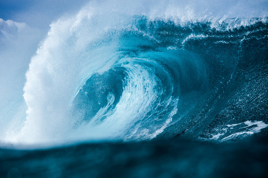 Close-up of large blue breaking wave in Pacific Ocean, Hawaii, USA