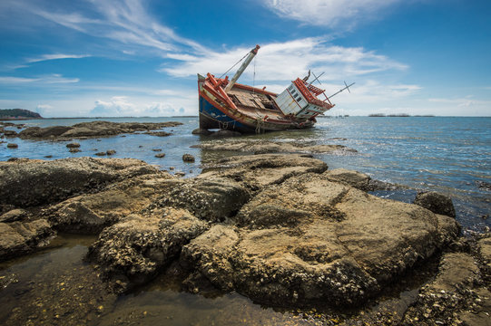 Shipwreck near rocky coast