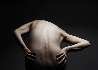 Woman with twisted back