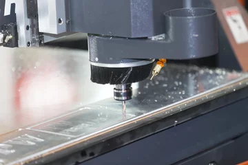 Fotobehang CNC  machine cutting acrylic plate © sorapolujjin