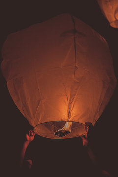 Paper lantern flying at night