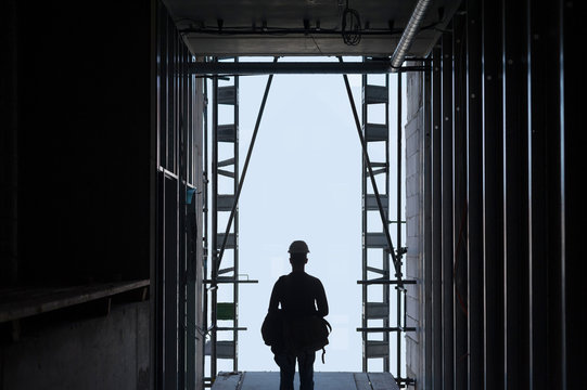 Germany, Silhouette Of Construction Worker 