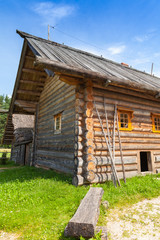 Old bench stands near rural Russian house