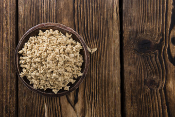 Wooden background with Soy Meat