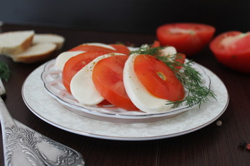Caprese salad with tomatoes, mozzarella