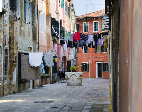 Venice alley passage traditional street with clothes drying 