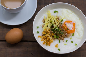 Congee of traditional food Chinese style with soft-boiled egg