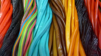 Foto auf Acrylglas Süßigkeiten Bunte Fruchtgummischlangen, Bild 