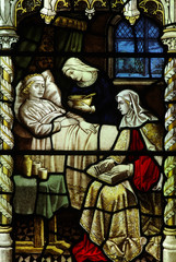 Nursing a sick person (in stained glass)