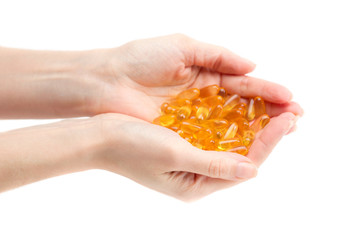 Omega 3 in female hands.