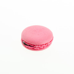 pink macaron on white background