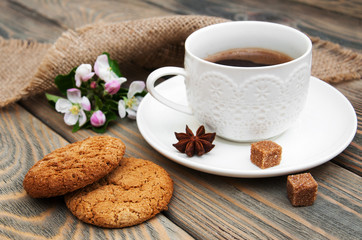 Cup of coffee and oatmeal cookies
